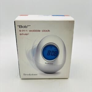 BROOKSTONE “BOB” SILVER OVAL EGG WOBBLE CLOCK 5-in-1 ALARM DATE TIMER TEMP CLOCK